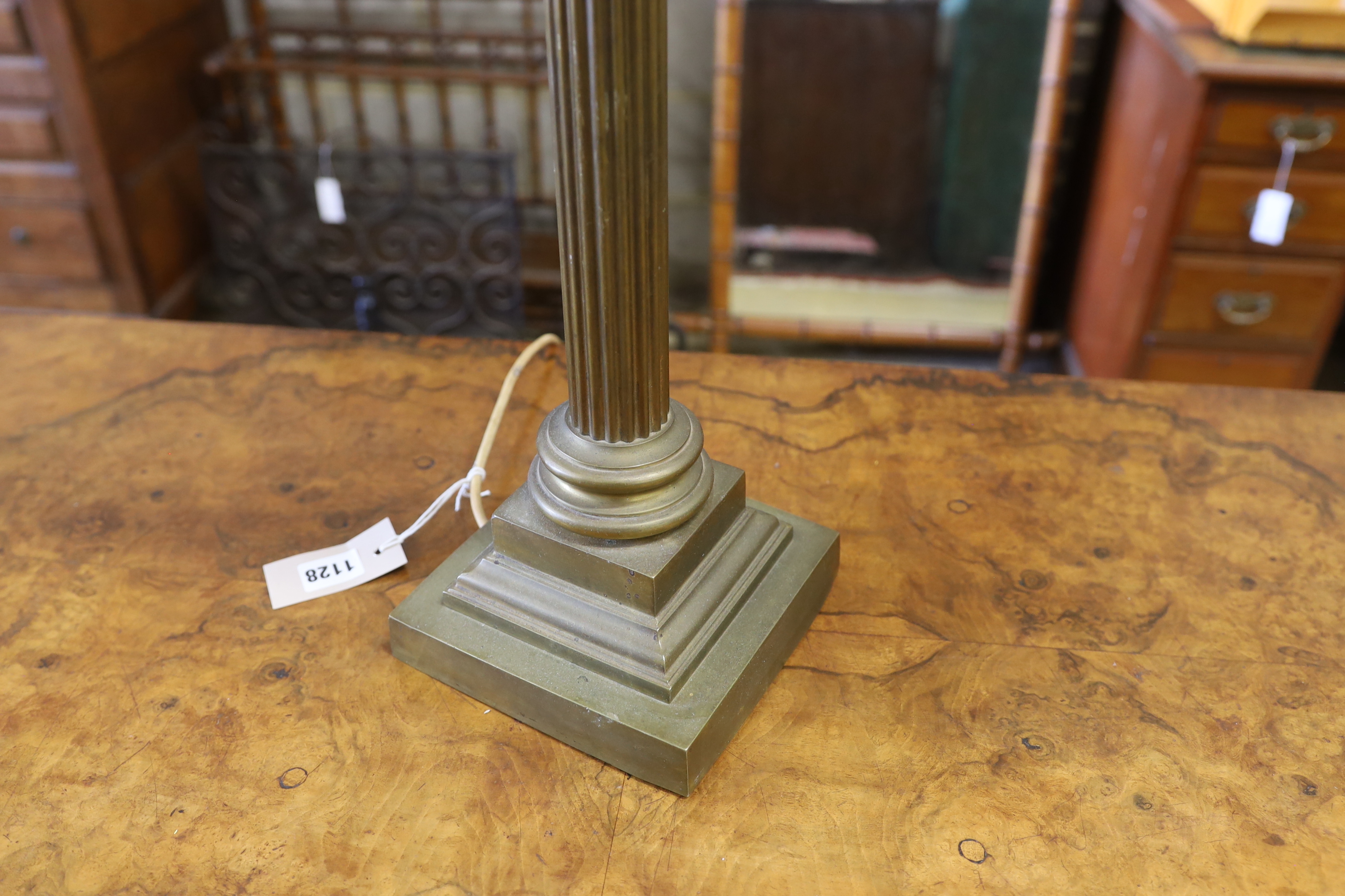 A brass Corinthian column table lamp, height including shade 76cm